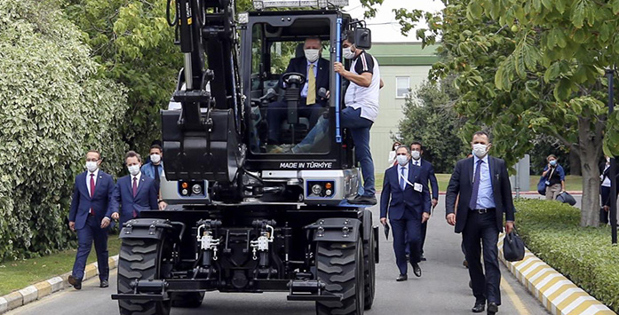 Image of President Erdogan Driving Electric Excavator